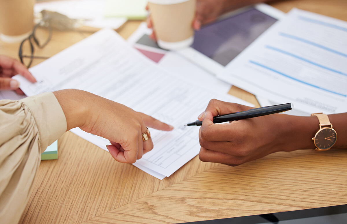 Hands, paperwork and signing contract