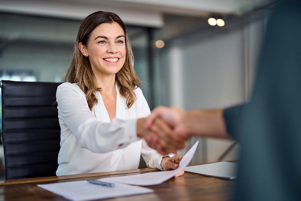 Happy mid aged business woman manager