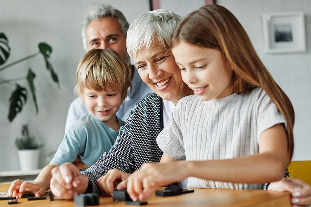 grandchild family child grandparent grandfather grandmother game playing domino